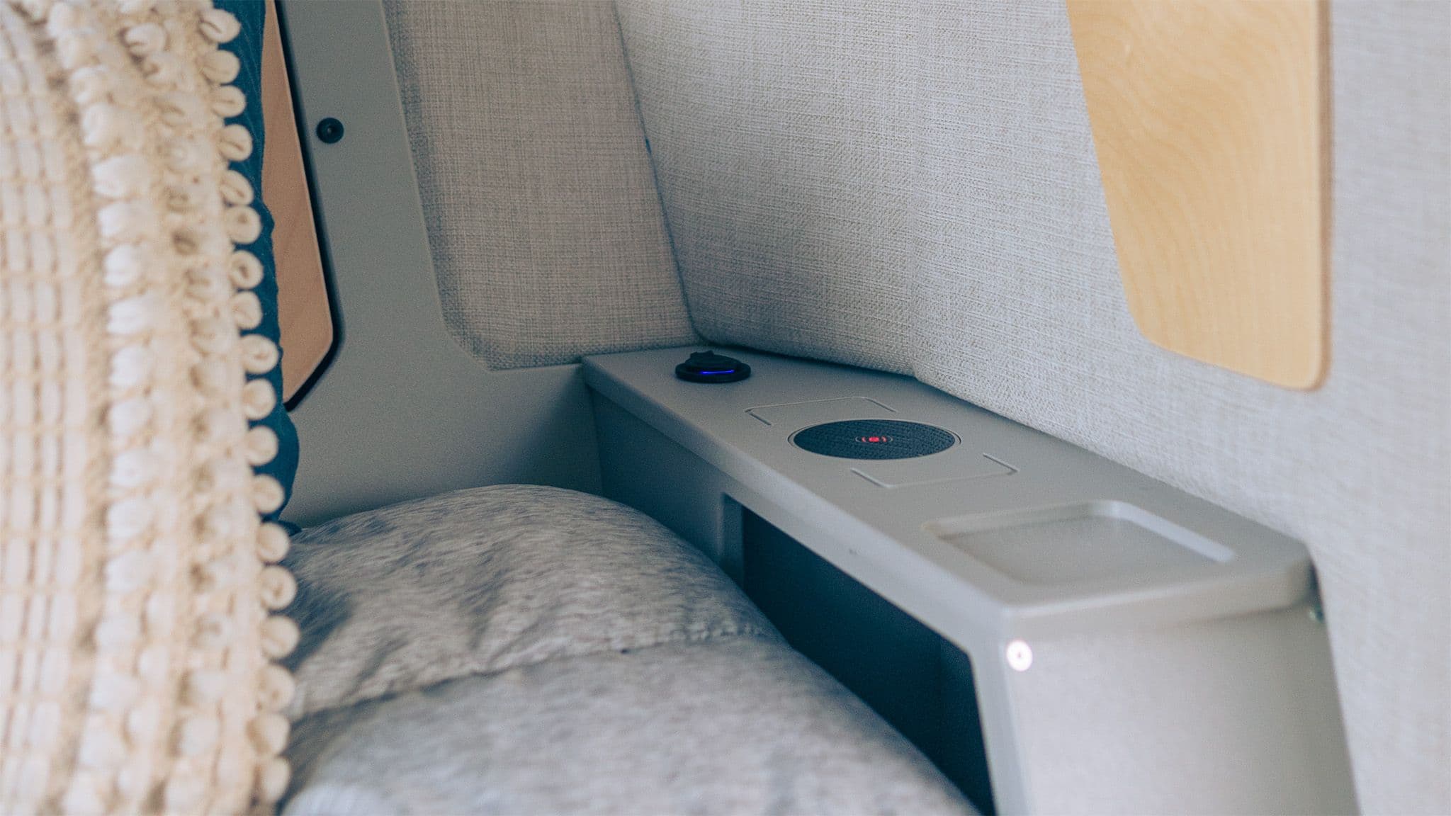 A close up of the nightstand design inside the cabin of the Escapod TOPO2.